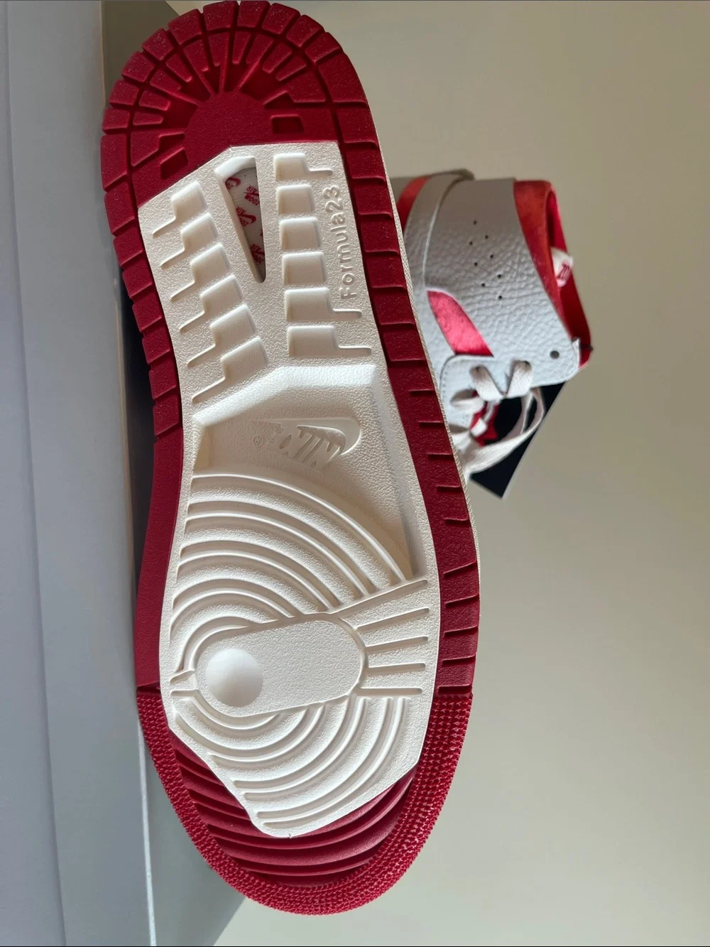 Jordan Women’s High-Top Sneakers in White and Red